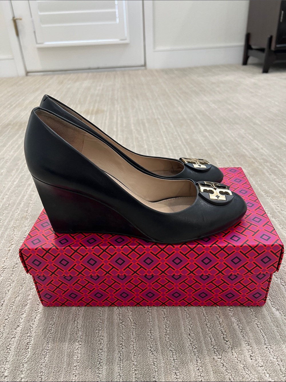 Tory Burch Women's Black Leather Wedge Pumps with Gold Accent